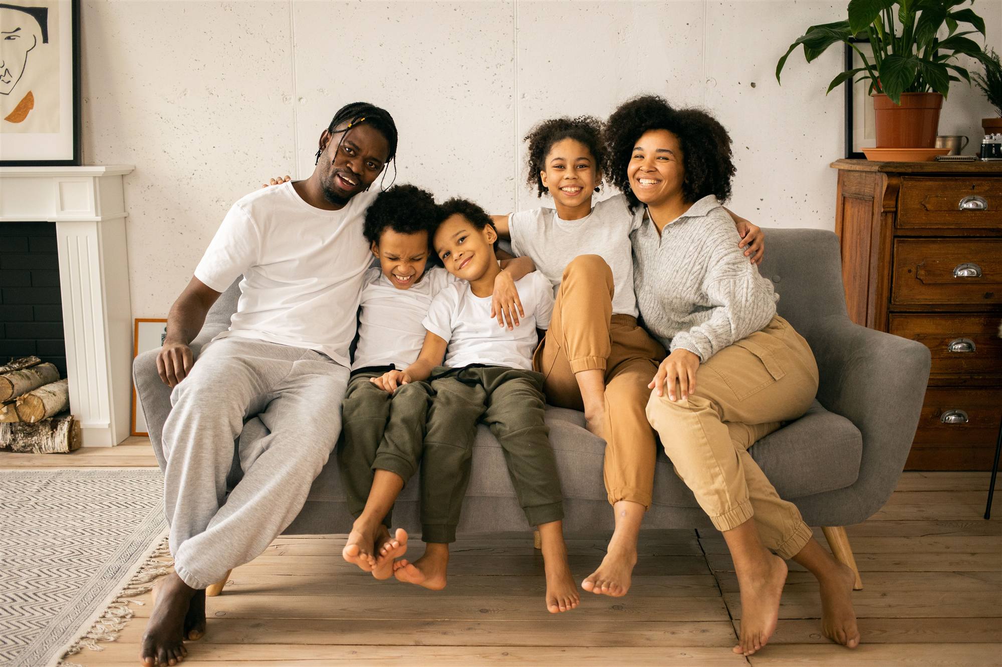 Family smiling together at home